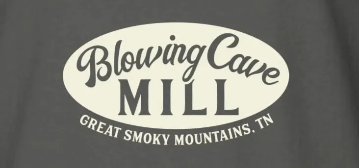 Blowing Cave Mill logo on gray background, Great Smoky Mountains, TN.